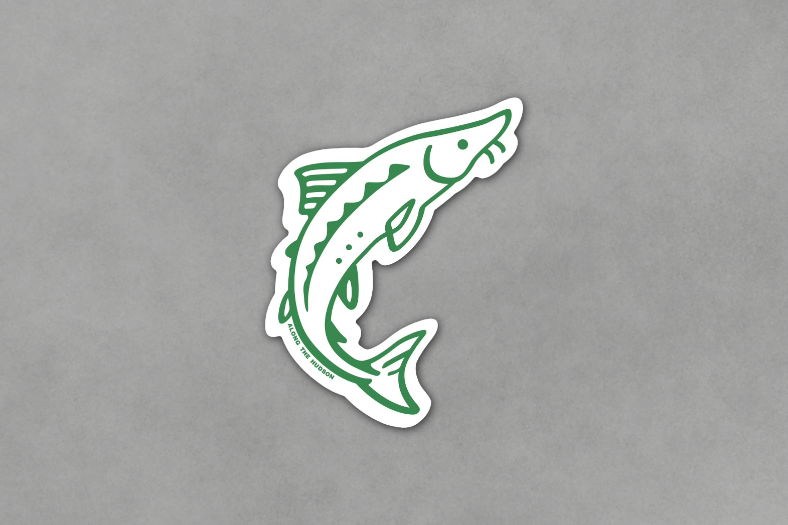 Green sturgeon-shaped sticker on a gray background.