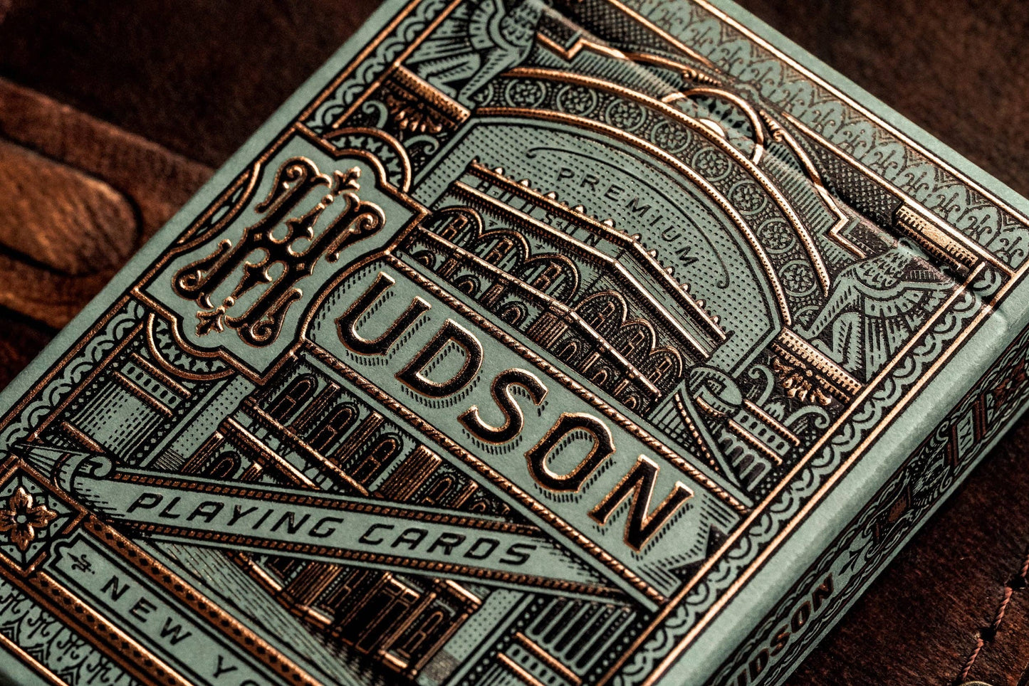Green Hudson playing cards with detailed design.