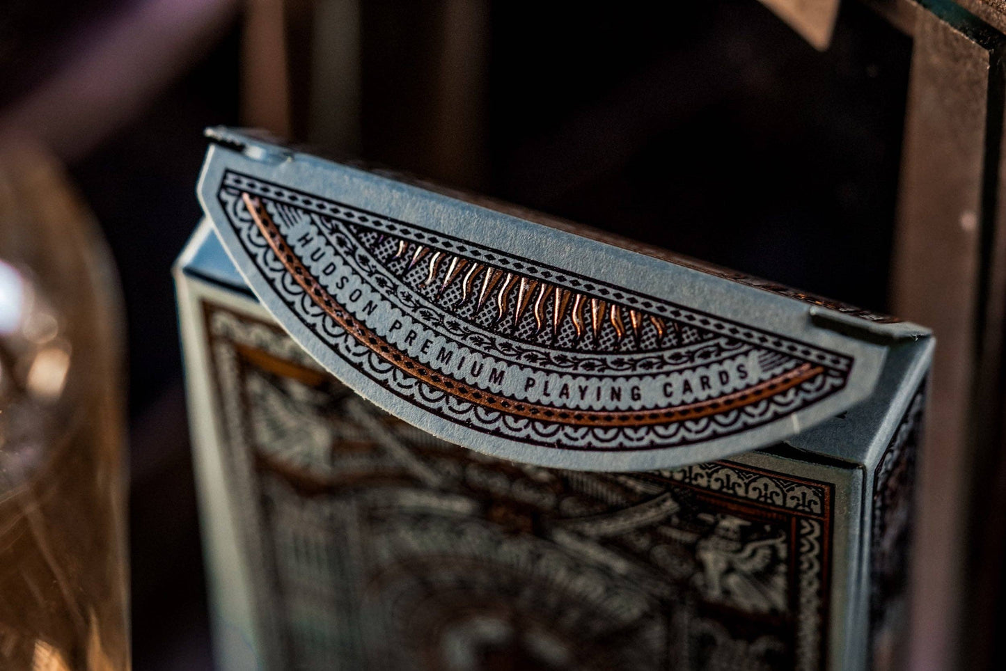 Close-up of a deck of cards with intricate design.