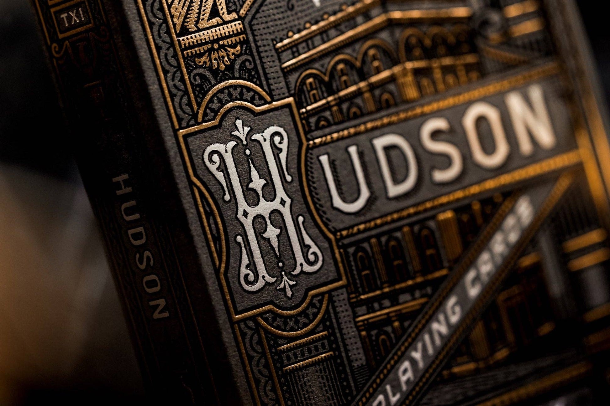 Close-up of Hudson playing cards with intricate design and branding.